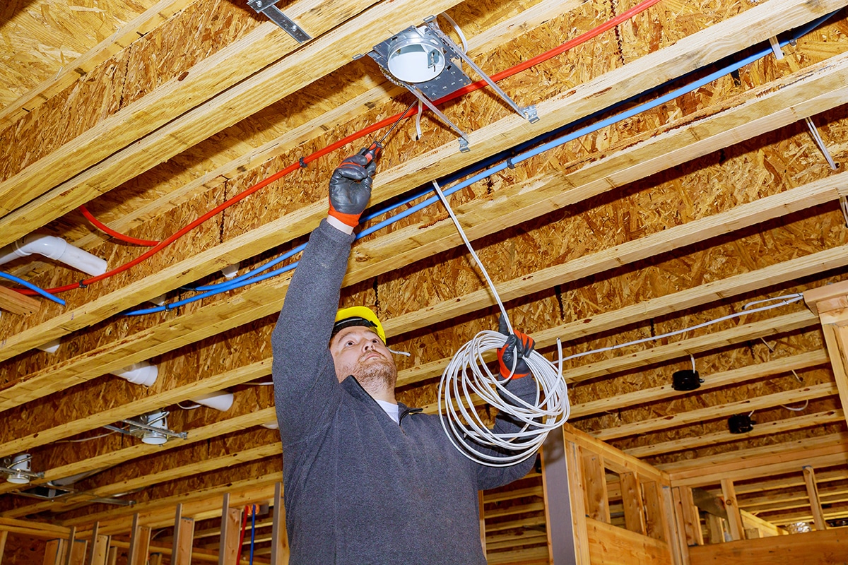 installing electric wiring for lights in the ceiling for a newly constructed house